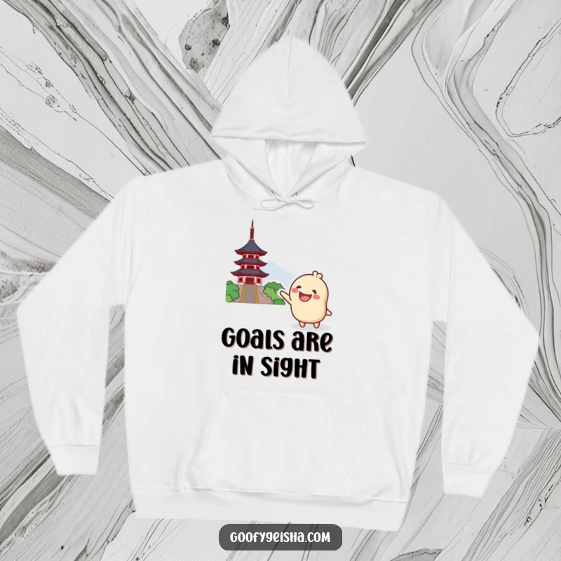 Funny Kawaii Hoodie: Grinning character excitedly pointing towards a distant pagoda, offering warmth, comfort, and a touch of funny adventure.