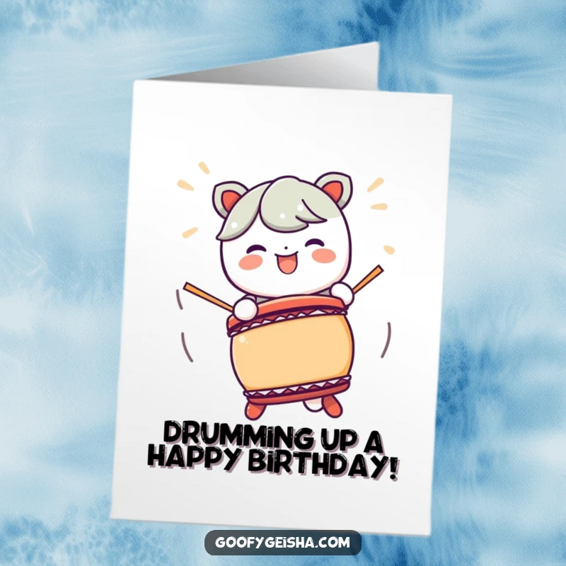 Funny Free Printable Birthday Card: A Kawaii character energetically plays a Taiko drum with big, happy motions. A downloadable card to print at home.