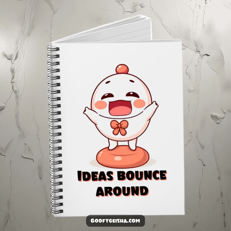 Funny Daruma doll notebook with a cover featuring a tiny, happy character energetically bouncing, ready for all your notes.