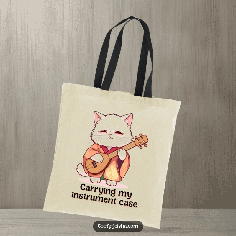 Funny Tote Bag with a fluffy white cat in a vibrant kimono awkwardly attempting to play a shamisen, perfect for carrying daily items.